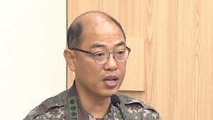 North Korean warship 'lying sideways in the water' after botched launch