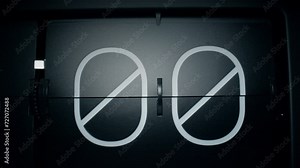 Flip clock quickly flips through the numbers from 58 to 00.