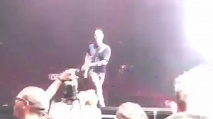 The moment Josh Homme kicks photographer in the face