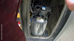 Filling DEF fluid into a RV diesel class A 2014 on the passenger side (right side) of the RV.