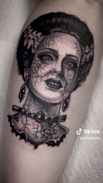 Spooky bride of Frankenstein. Ready to unleash this haunted season. By Amanda at Evol Tattoo Catasauqua Pennsylvania USA #spookyseason #brideoffrankenstein #haunted #halloween #halloweentattoo #tattoovideo #tiktoktattoo #darktattoo