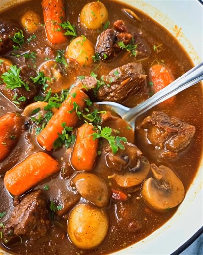 3.1K views · 23 reactions | Hearty, comforting, and full of rich flavor—this Beef Stew is the ultimate cozy classic. With tender beef, hearty vegetables, and a slow-simmered broth, it’s a recipe that warms you from the inside out. ............. Full Recipe in Coʍmеոτ  | Tasty American Kitchen | Facebook
