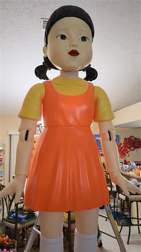 6.3K views · 123 reactions | She is now at home, testing her out and she's amazing, cant wait to debut her at Infinity Convention in Gainesville with my Pokémon Squid Game crossover experience. Thank you Spirit Halloween  Nothing like having a killer doll in your living room facing the front door, great home security system though.  | Pikabellechu | Facebook