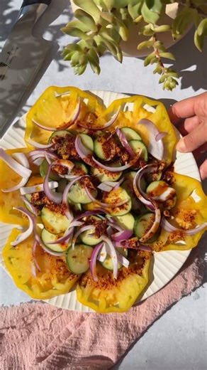 Christy Daoud | Be Happy Foodie on Instagram: "Crunchy Cucumber & Yellow Tomato Salad with Gochugaru Dressing This fresh and crunchy cucumber and yellow tomato salad is simple, flavorful, and finished with a quick gochugaru dressing made from pantry staples. Light, slightly spicy, and perfect as a side dish or easy lunch salad. INGREDIENTS • 1 Heirloom tomato , sliced • Handful Persian cucumbers, sliced • Handful Red onion, thinly sliced Gochugaru Dressing • 2 tbsp olive oil • 1 tbsp rice vinega