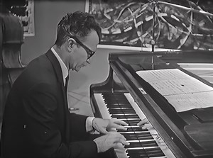 Dave Brubeck - Blue Rondo à la Turk (1959) Dave Brubeck's "Blue Rondo à la Turk" from his 1959 album Time Out is an innovative jazz piece known for its unconventional 9/8 time signature inspired by Turkish music Brubeck encountered during a Eurasian tour. Unlike the traditional division of the rhythm, Brubeck uses a complex pattern of 2 2 2 3, creating a lively and captivating beat that distinguishes the piece. The composition begins with a robust, staccato piano line that fully utilizes the uni