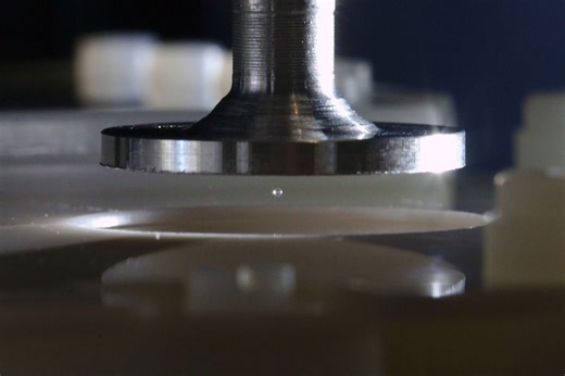 Electrically charged dust creates hazards on Mars and the Moon — an invisible carbon layer may explain why