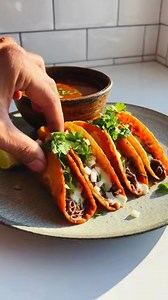 Short Rib Birria Tacos 🌮🔥 📝 Ingredients 3 lbs beef short ribs, bone-in 2 tbsp olive oil 1 small onion, quartered 5 cloves garlic 3 dried guajillo chiles, seeds removed 2 dried ancho chiles, seeds removed 1 chipotle pepper in adobo (optional, for heat) 1 tsp ground cumin 1 tsp dried oregano ½ tsp ground cinnamon 1 tsp paprika 1½ tsp salt (or to taste) ½ tsp black pepper 2 tbsp apple cider vinegar 4 cups beef broth (low sodium, no sugar added) For Serving Small corn tortillas Shredded Oaxaca or