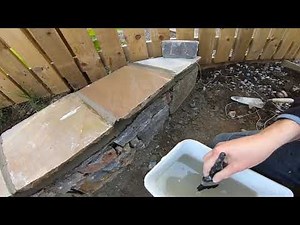 Fixing and Pointing coping stones on a drystone wall