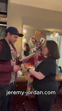 Jeremy receiving his Tony book from his fans