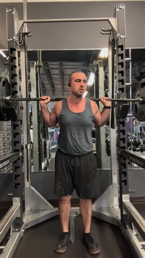 Stephen Chibidakis on Instagram: "Why would I torture myself with 225 like this? Because real life doesn’t give you momentum. Most things you pick up — kids, groceries, awkward objects — start from a dead stop. No bounce. No preload. Just force production. By setting the bar completely down on the safeties and pausing, I remove the stretch reflex and elastic rebound. That forces the concentric phase to do all the work. Concentric-focused training teaches your nervous system how to: • Recruit mor