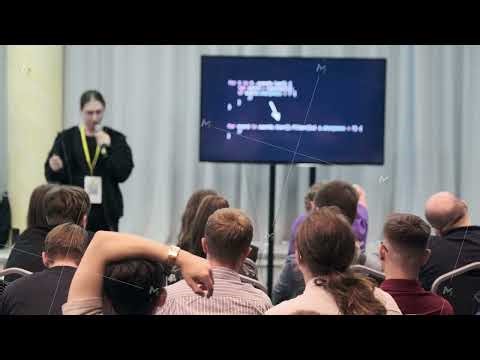 Speaker presenting slides to an audience during a professional seminar