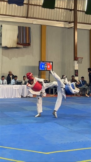 Dynamic Dojang on Instagram: "ONE KICK. TOTAL DOMINATION. 🥋💥 A perfectly timed head kick that changes everything. Pure power, precision, and control — this is what elite Taekwondo looks like. No hesitation. No mercy. Just speed, balance, and a fight-ending strike. Respect to both fighters for stepping on the mat 👊 . . . . . . . . . #Taekwondo #TaekwondoKO #KnockoutKick #HeadKick #MartialArts #CombatSports #TaekwondoLife #TaekwondoFighter #TKD #Sparring #FightReel #KO #EliteAthlete #WorldTaekw