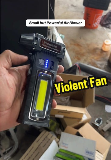 This mini high-power air blower packs extreme strength in a compact size. With a high-velocity fan, dual LED emergency lights, and a magnetic base, it’s perfect for car repairs, camping, emergencies, and home use. #HighPowerBlower #PortableAirBlower #RechargeableBlower #MagneticWorkLight #MultiToolGadget