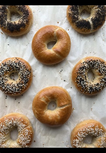 Best Homemade Bagels! 🥯 Dough: - 3 1/2 cups bread flour - 1 1/2 cups water, lukewarm - 1 tbsp oil - 2 1/2 tsp instant yeast - 1 1/2 tbsp brown sugar - 1 tsp salt Water bath: - 6-8 cups water - 2 tbsp honey Egg wash: - 1 egg, beaten - 1 tbsp water Toppings: - Sesame seeds - Poppy seeds - Everything seasoning Bake at 425 F for 20-25 minutes Makes 8 bagels 1. Mix warm water, brown sugar, and yeast and let it sit for about 5 minutes until foamy. 2. Add the oil, salt, and flour, then mix with a doug