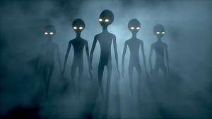 3D rendering. Scary gray aliens walks and looks blinking on a dark smoky background.