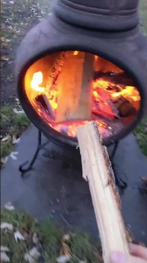 Backyard bushcraft with cozy chiminea campfire and stacking firewood ‪@Shrubcraft‬
