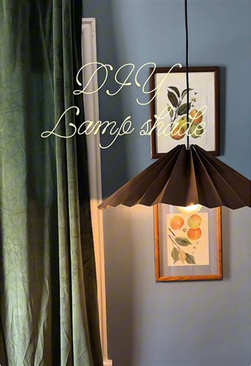 DIY lamp shade for my kitchen! Side note- why are lamp shades over $100??? Eventually I’ll get a real one but I’m happy with how this little project turned out 💡🤎 • • • #chicagoapartment #renterfriendlymakeover #diylampshade #kitchenmakeover