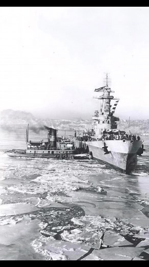 The North Carolina-class battleship USS Washington (BB-56) sails through the icy Arctic waters on December 28, 1945. Emerging from World War II, she demonstrates the strength, endurance, and versatility of the United States Navy in extreme conditions. | Forgotten War Facts