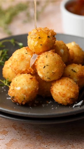 Elevate a log of goat cheese by making these fried goat cheese balls! You can also make them into medallions if that’s more your style. Serve with a bit of honey, pepper jelly, or even marinara and you’ve got yourself a winner. ✨Comment “cheese” and I’ll send the recipe link straight to your DMs! Or Google “goat cheese balls the cozy plum” to find the recipe. https://thecozyplum.com/crispy-fried-goat-cheese-balls-option-for-air-fryer/ #thecozyplum #thekitchn #inmykitchentoday #lovetobake #loveto