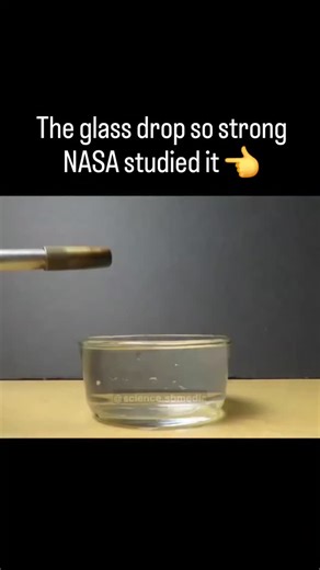 Event Horizon Facts on Instagram: "A Prince Rupert’s Drop looks like a fragile glass tear… but it can survive a hammer blow 💥. The secret? Rapid cooling creates extreme compressive stress on the outside and tension inside. That makes the bulb almost unbreakable — until the tail snaps, releasing stored energy and shattering it instantly. 🚀 NASA doesn’t build spacecraft out of these, but the physics behind them is crucial. Studying Rupert’s Drops helps scientists understand: How stress distribut