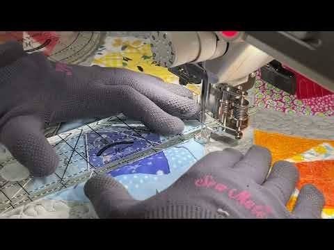 Quilting different patterns on a paper pieced quilt