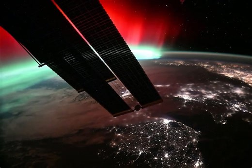 Watch northern lights from space as they glimmer above Earth