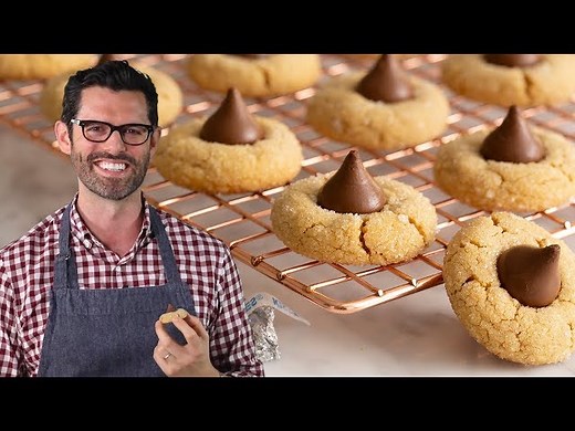 My easy, melt-in-your-mouth peanut butter blossoms have lots of peanut butter flavor and a big kiss of chocolate right in the middle. | Preppy Kitchen