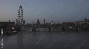 London Eye and Big Ben's Elizabeth Tower from Waterloo Bridge