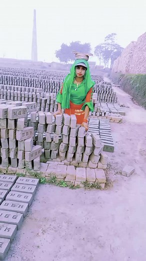 Traditional Brick Carrying Skills Demonstrated by Woman