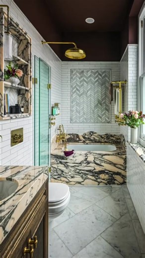 Stop scrolling! You're looking at a literal bathroom work of art. The marble, the brass, the tile... Simply Bathrooms have nailed it again! 🤩 🚰: Grosvenor Cross Polished Gold Bathroom design, supply, installation and photography by @simplybathroomsltd. #LuxuryBathroom #MarbleBathroom #BathroomGoals #InteriorDesign #SmallBathroomDesign