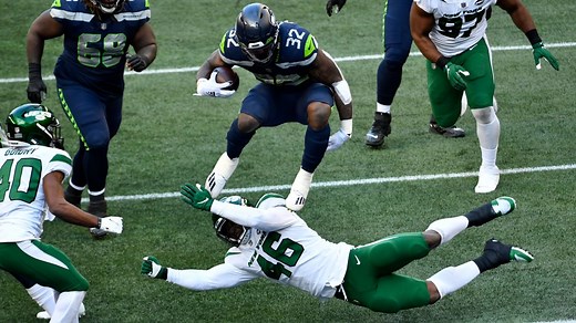 Chris Carson punctuates TD with goal-line hurdle