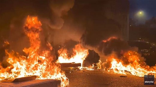 PSG fans set Paris on fire and clash with French police on deadly night of celebrations