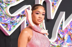 Saweetie Gives Us Main Character Energy In A Yellow Fur Coat