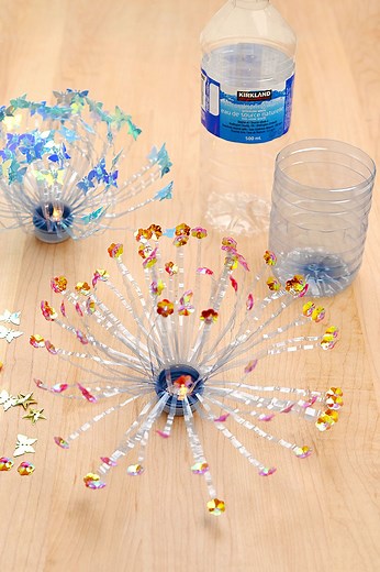 17K views · 148 reactions |  These fireworks are all sparkle, with zero spark! Turn empty plastic bottles into glow-tastic, mess-free fireworks with just a few simple supplies—and a little crafty magic. ✂️✨ https://onelittleproject.com/water-bottle-fireworks-craft/ | One Little Project | Facebook