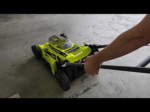HOW TO UNFOLD THE HANDLE ON THE RYOBI 40 VOLT LAWN MOWER