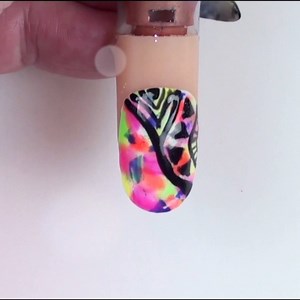 2.4K views · 14 reactions |  These fun neon tribal nails are just...