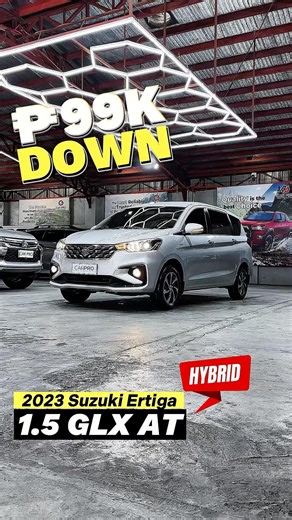2023 Suzuki Ertiga 1.5 GLX AT Hybrid in elegant Silver.