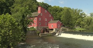 What makes the Red Mill Museum Village a fan favorite?