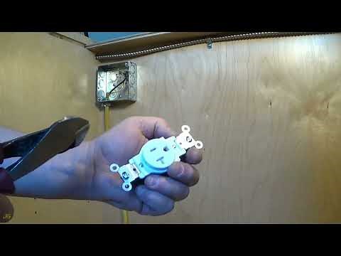 Installation of a receptacle for a microwave oven in kitchen island cabinets