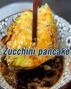 5.3K views · 77 reactions | 丹With zucchini, 讀egg and flour as the main ingredients, the zucchini 說pancake is a popular breakfast among Beijingers because of its simple preparation. #SavorBeijing #AmazingBeijing #DiscoverBeijing #FoodieDelights | Discover China | Facebook