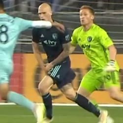 SAVE: Tim Melia comes off his line to deny Chris Wondolowski