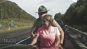 Dashcam video shows controversial pat-down of female driver