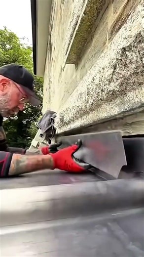 repairing home building wall with lead flashing to prevent leaking and ensure durability of roof