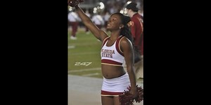 Local cheer coach makes history