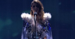 Moments Into Singing Queen's Megahit 'Bohemian Rhapsody,' Woman Tears Off Robe & Has Simon Saying That Her Voice Is 'Off The Charts'