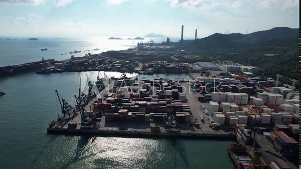Tuen Mun River Container Trade Terminal , the main Far East Asia-Pacific trade shipment logistic port facility near Chek Lap Kok in Hong Kong, China, Asia, Drone Aerial Skyview