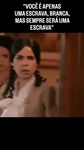 Jn. Miguel S.F on Instagram: ""VOCÊ É APENAS UMA ESCRAVA, BRANCA, MAS SEMPRE SERÁ UMA ESCRAVA" - Malvina maltrata Isaura por ciúmes de seu marido - Cena de A escrava Isaura (2004) - Publicada em 1875, A Escrava Isaura, de Bernardo Guimarães, é uma das obras mais conhecidas do romantismo brasileiro — e uma das mais problemáticas. Sob o pretexto de denunciar a escravidão, o autor constrói uma história centrada em uma escrava “quase branca”, de pele clara, dócil e virtuosa. Essa escolha não foi ino