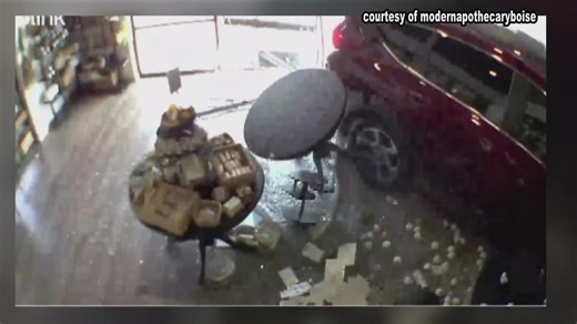 Video: Owner walks away unharmed after car crashes into storefront