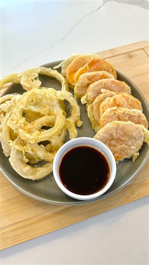 John and Chelsea on Instagram: "My wife was craving some Tempura so I made this delicious fried vegetable tempura at home! You can use different veggies for this but we like using sweet potatoes and onions! It’s so crispy and super tasty! Ingredients: - onions - sweet potatoes - 2 cups of @pillsbury all purpose flour - 1 1/2 cups of water - 1 teaspoon salt - Sriracha sauce - @kikkomanusa soy sauce #tempura #japanesefood #EasyRecipe #Recipe #japaneserecipe #appetizer #easyrecipes #sushi #cooking 