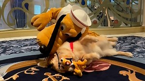 Watch this charming video of Pluto greeting happy golden retriever and Disney superfan Forest